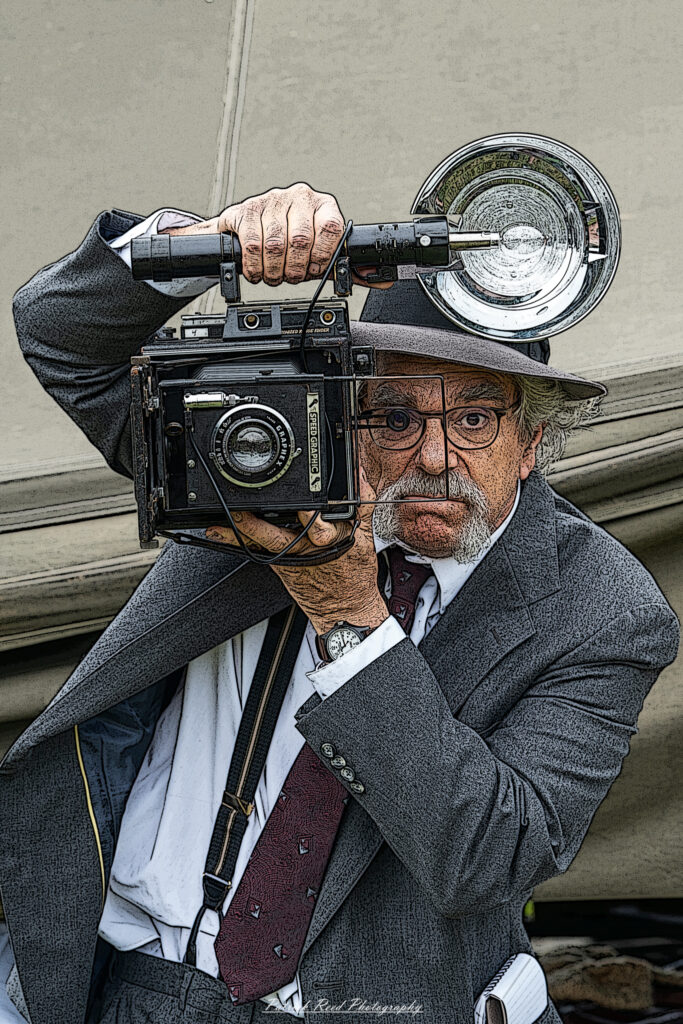 A cartoonized image of a 1940s photographer, characterized by exaggerated features and vibrant colors. The photographer is depicted holding a classic camera, wearing period-appropriate clothing such as a fedora and a suit, with a playful expression that captures the spirit of the era.